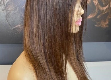 Sleek brunette hairstyle at Hairworkz Hairdressing, Rode Heath, England, GB.