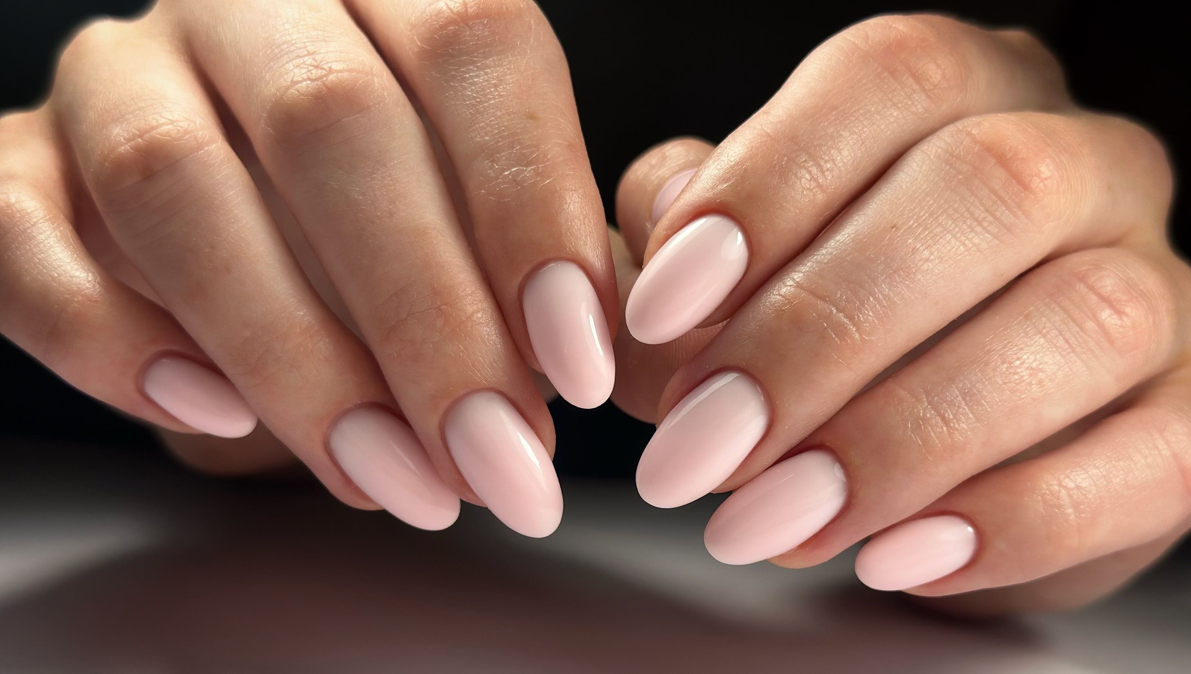 Close-up of elegant pale pink nails from Lordna Nails, Hamilton, Queensland, AU reflecting top-notch manicure.