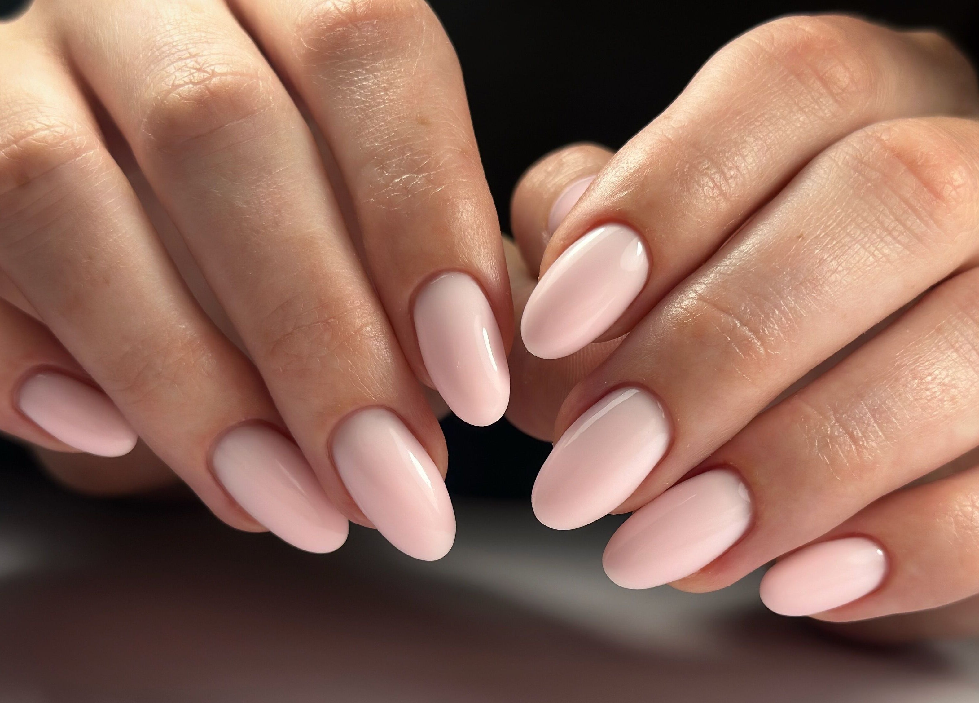 Close-up of elegant pale pink nails from Lordna Nails, Hamilton, Queensland, AU reflecting top-notch manicure.