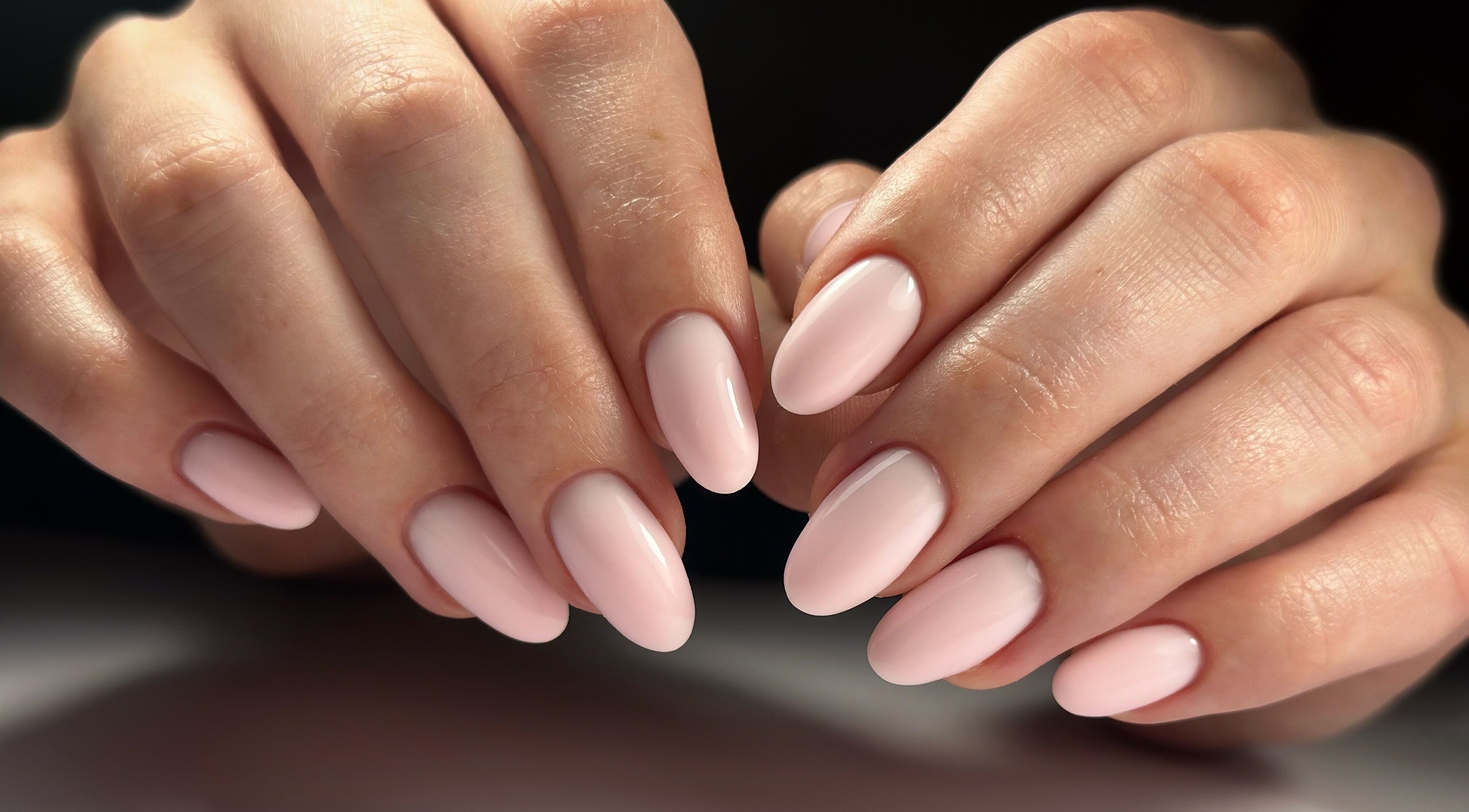 Close-up of elegant pale pink nails from Lordna Nails, Hamilton, Queensland, AU reflecting top-notch manicure.