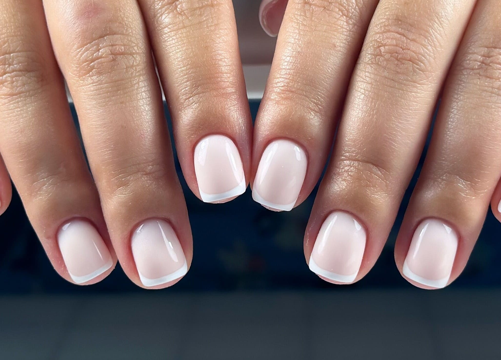 Classic French manicure at Lordna Nails, Hamilton, Queensland, AU, showcasing pristine white tips and glossy finish.