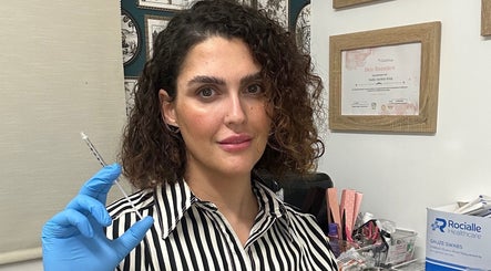 Nurse with syringe at PRETTY LITTLE FACES beauty clinic, Desborough, England, GB.