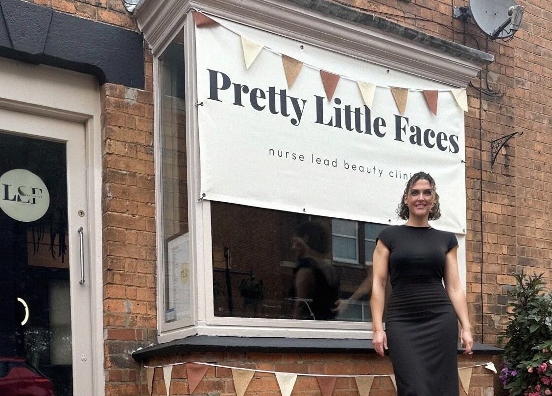 Entrance of PRETTY LITTLE FACES nurse led beauty clinic in Desborough, England, with welcoming signage.