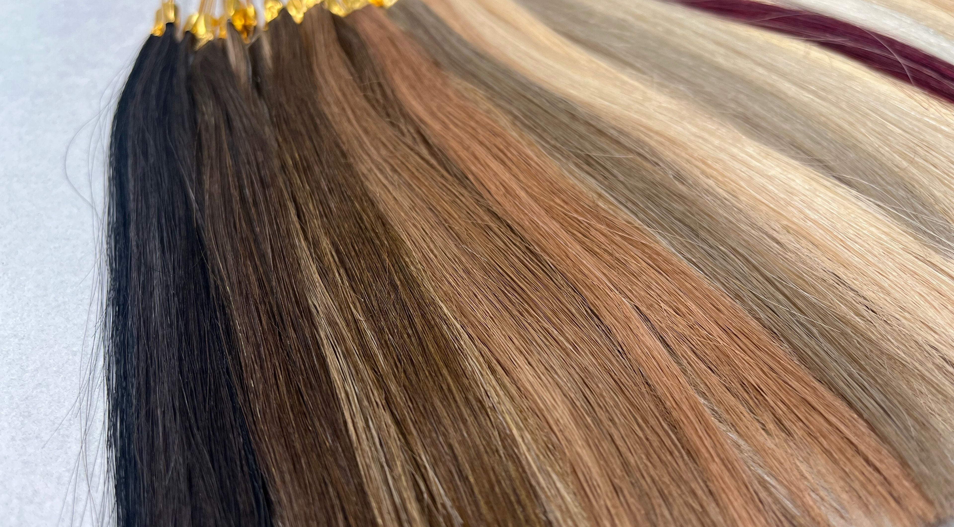 Variety of hair extensions in multiple shades at Hair By Brit, Haywards Heath, England, GB.