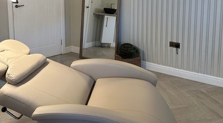 Relaxing spa chair at Eye Love Brows, Glasgow, Scotland, GB. Perfect for a soothing wellness experience.