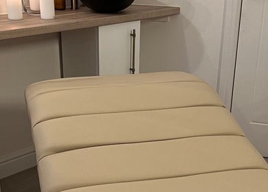 Relaxing treatment bed at Eye Love Brows in Glasgow, Scotland, GB, showcasing a calming atmosphere.