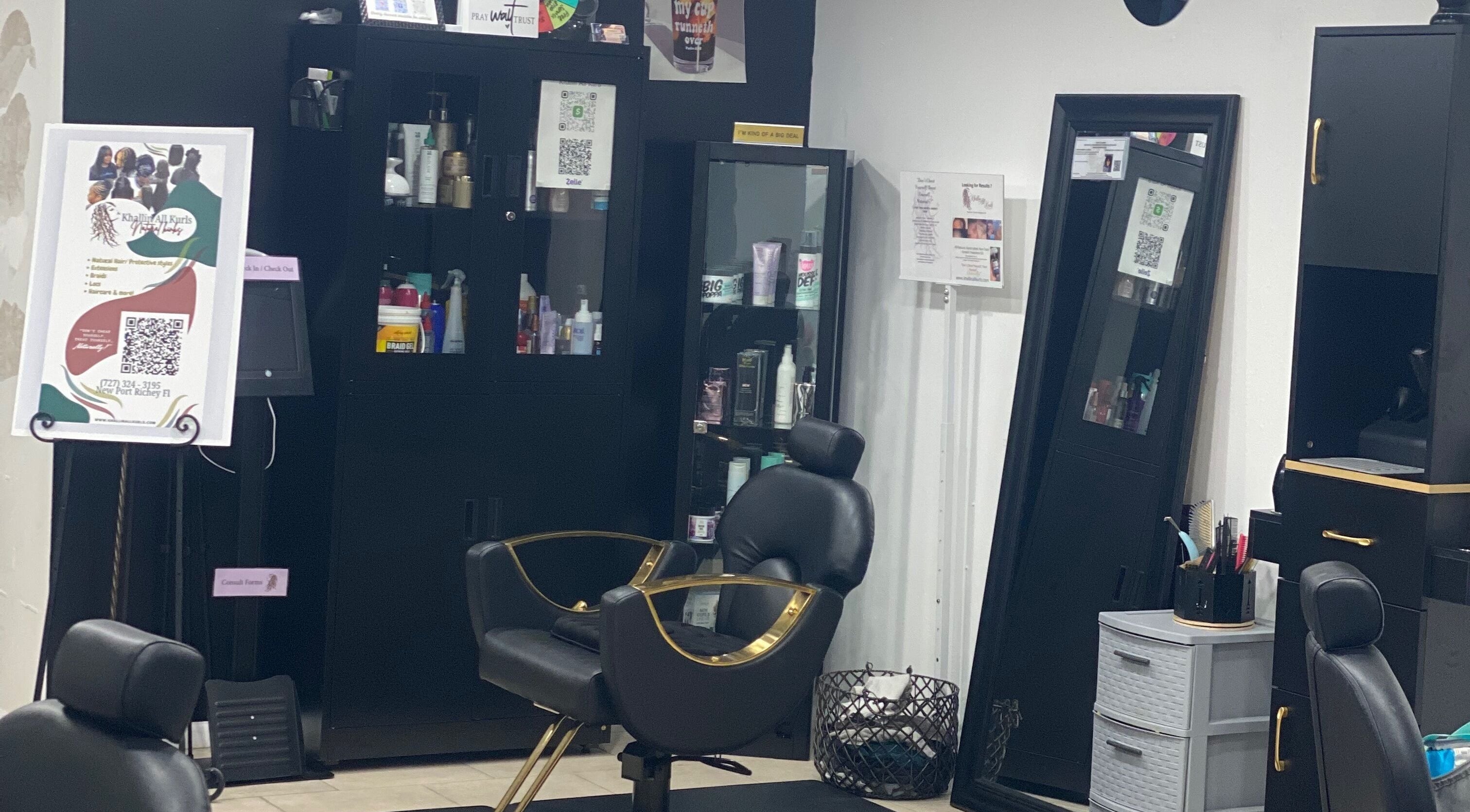 Khallin All Kurls Natural Kinks salon interior showcasing styling chairs and product shelves in New Port Richey, Florida.