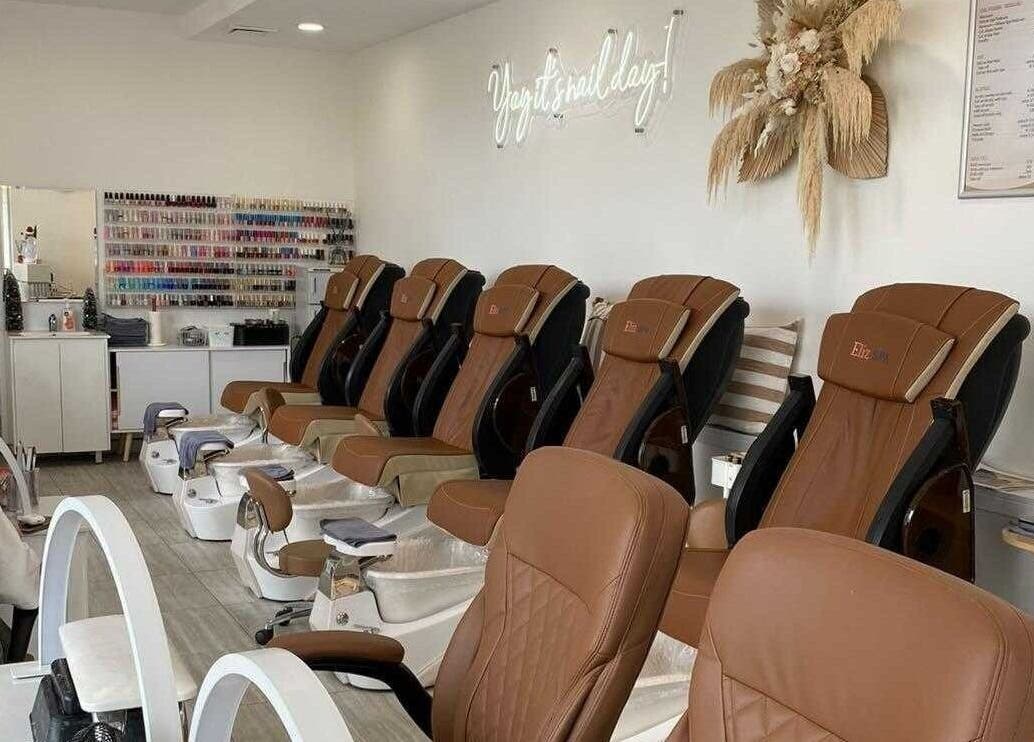 Sleek brown pedicure chairs at PC nails and beauty, Newington, New South Wales, AU offering comfort and style.