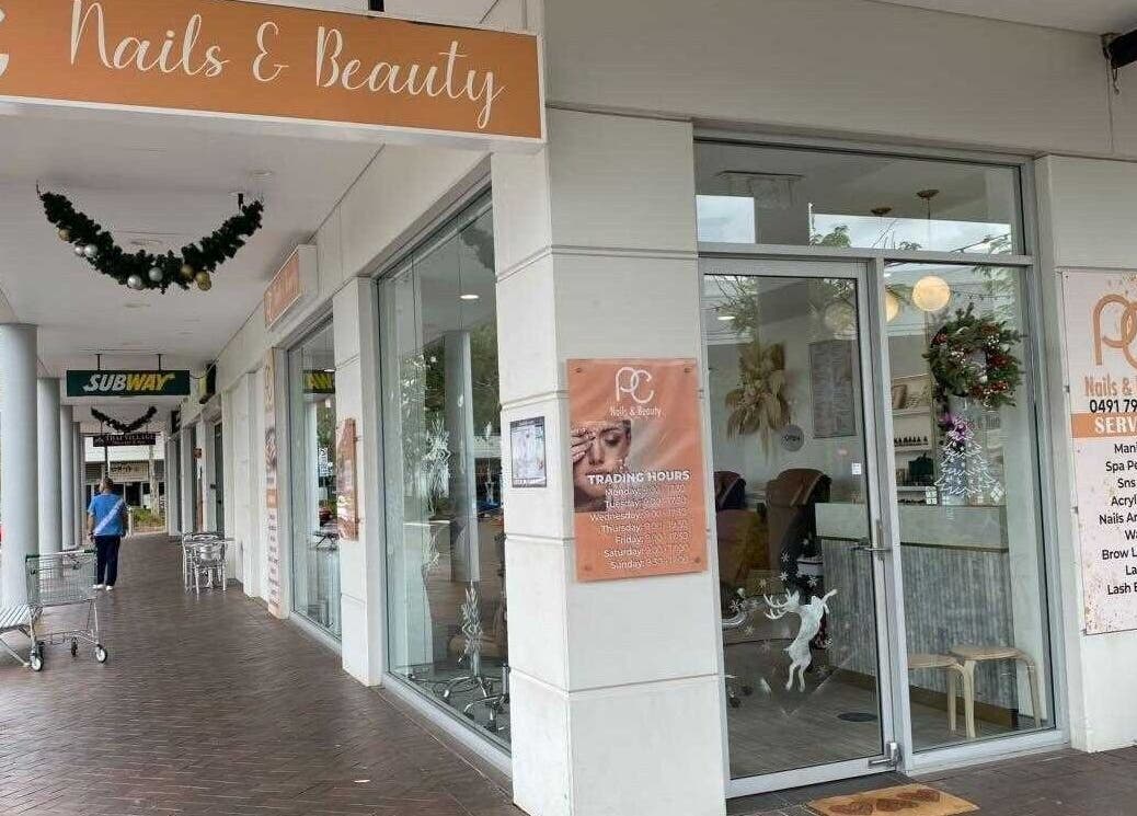 Front view of PC nails and beauty in Newington, New South Wales, AU, showcasing elegant signage and entrance.
