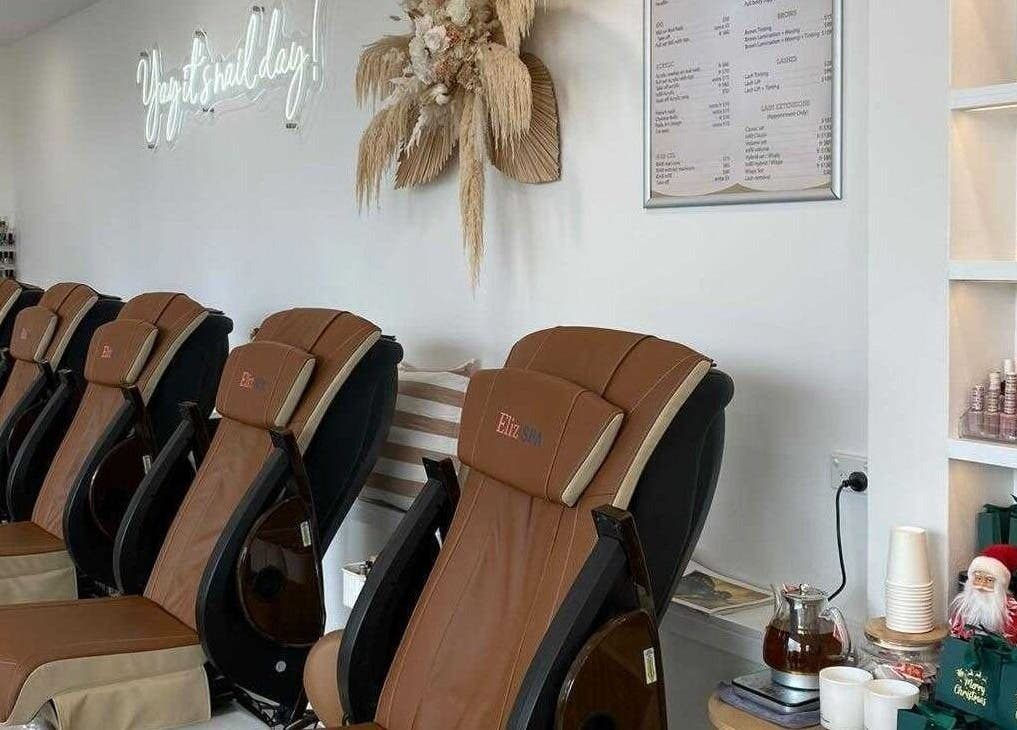 Luxurious massage chairs at PC Nails and Beauty in Newington, New South Wales, AU, promise a serene spa experience.