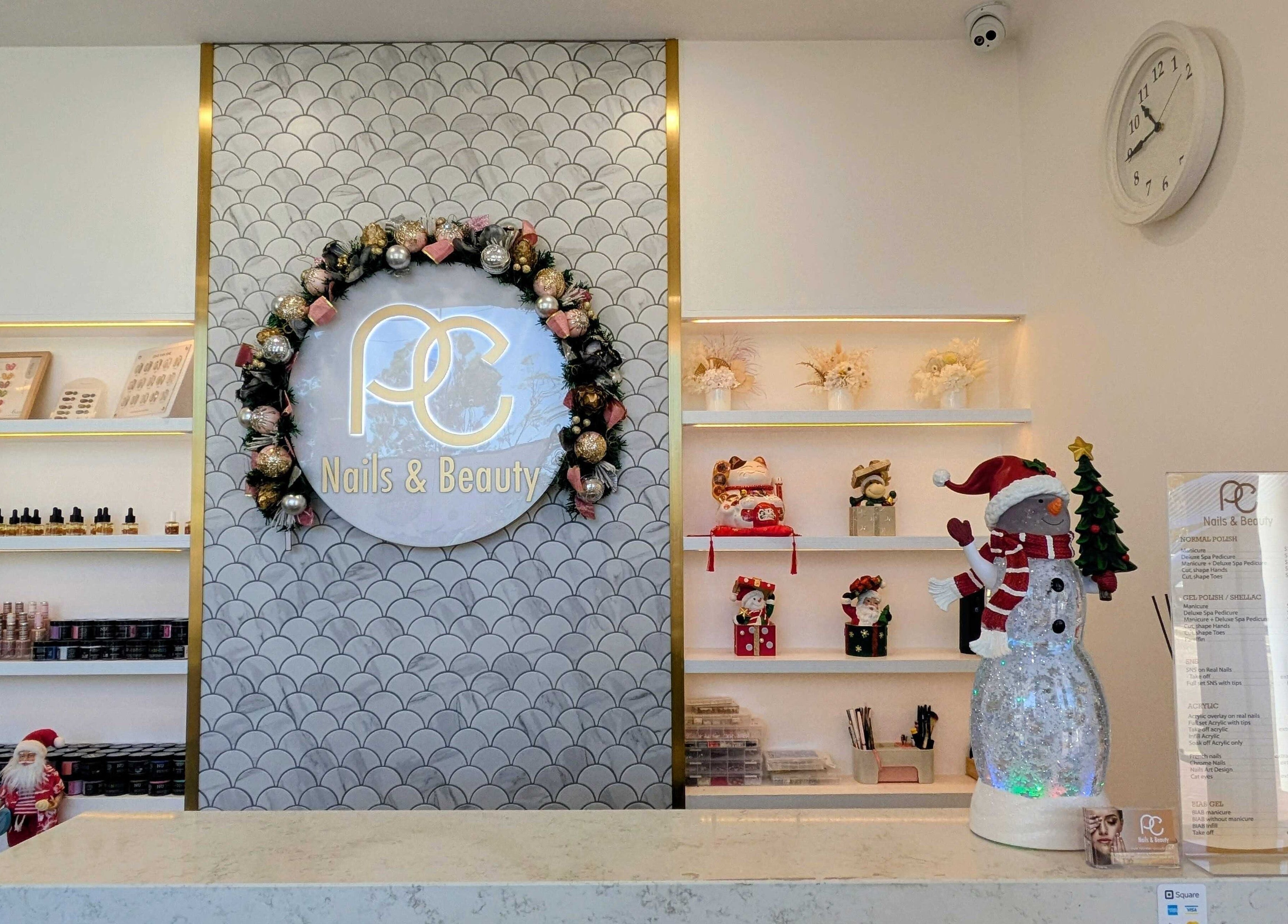 Elegant reception at PC nails and beauty, Newington, New South Wales, AU with festive decor and product displays.