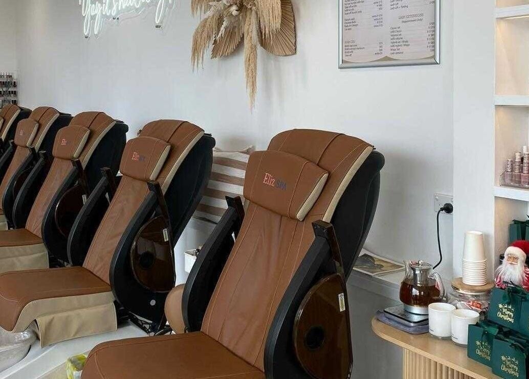 Relaxing pedicure chairs at PC Nails and Beauty, Newington, New South Wales, AU, creating a serene atmosphere.