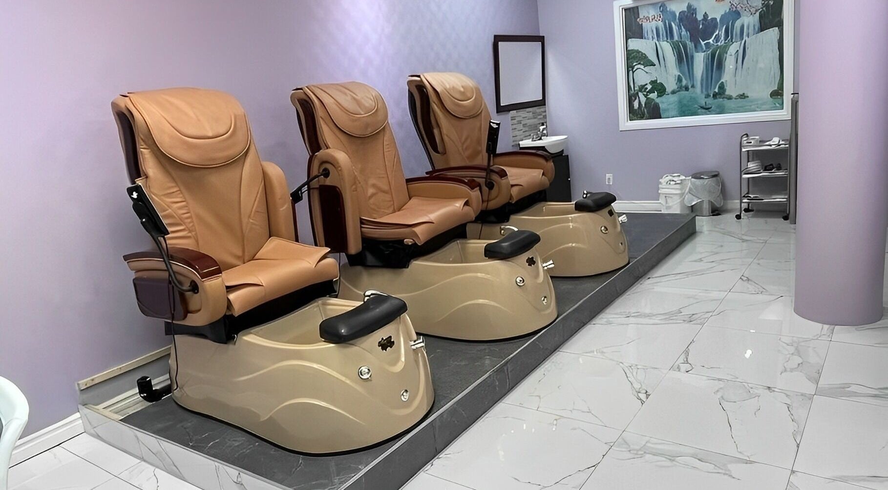 Luxurious pedicure chairs at Ongles Victoria, Saint-Lambert, Québec, CA offer comfort and relaxation.