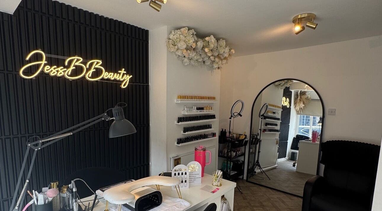 Chic interior of Jess B Beauty in Whitworth, England, GB, showcasing elegant decor and beauty products.