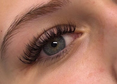 Close-up of eyelash extensions by Dolled Up By Em in Oxspring, England, GB showcasing lush, voluminous lashes.