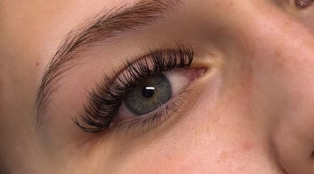Close-up of eyelash extensions by Dolled Up By Em in Oxspring, England, GB showcasing lush, voluminous lashes.