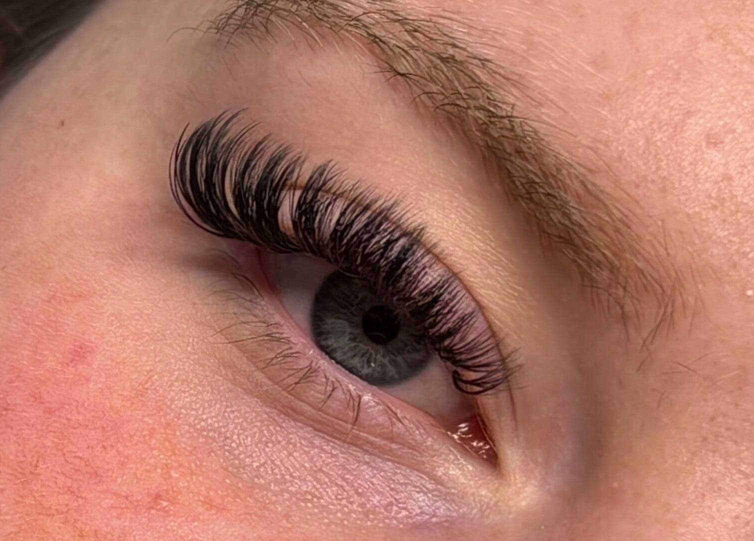 Close-up of exquisite eyelash extension from Dolled Up By Em at Oxspring, England, GB.