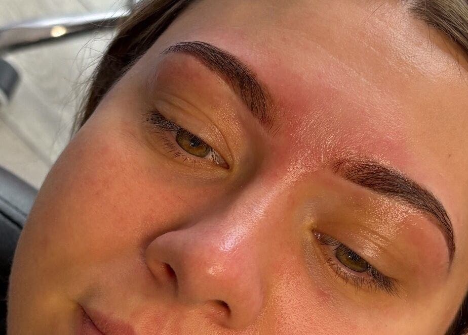 Freshly shaped eyebrows at Dolled Up By Em, Oxspring, England, GB showcased in intimate salon setting.