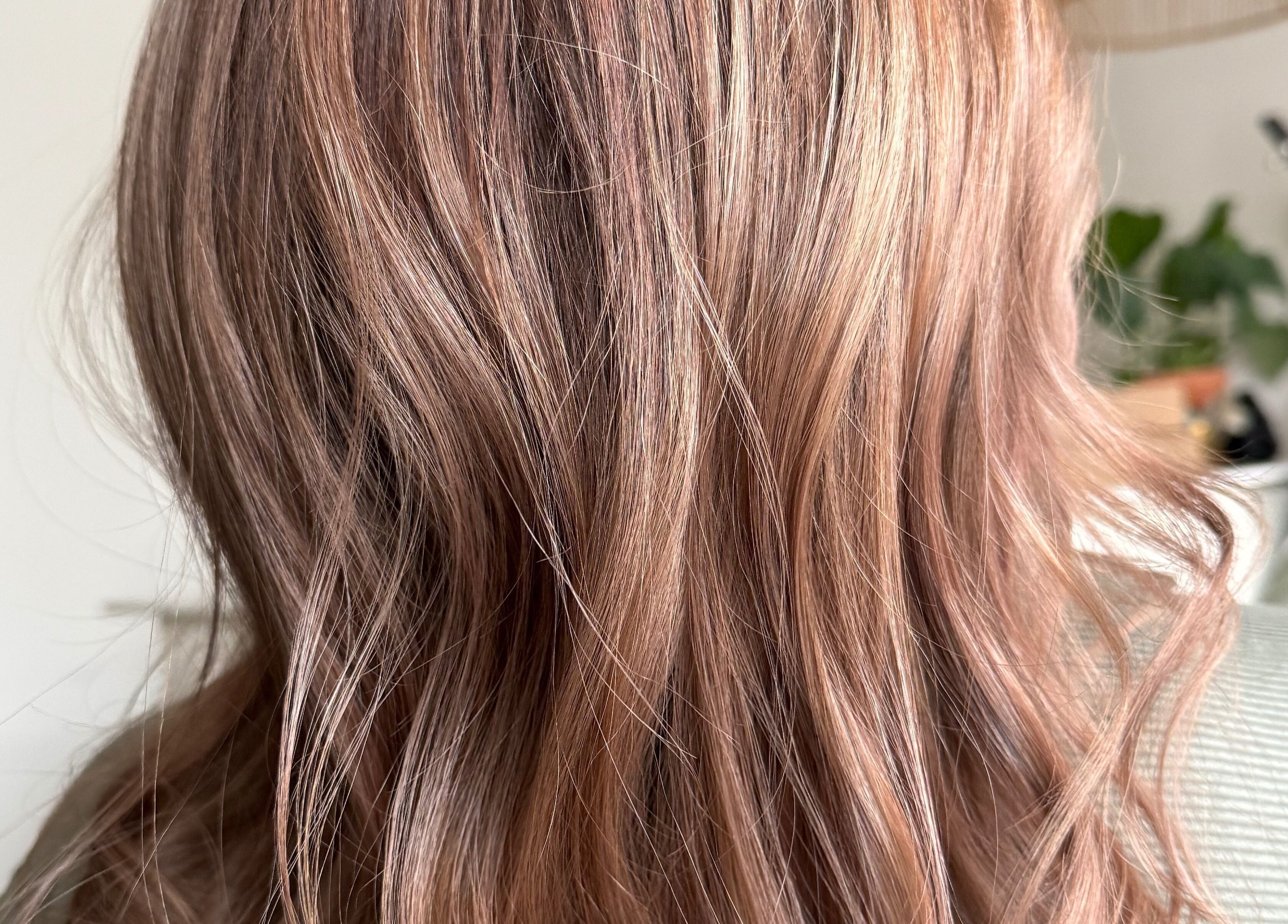 Elegant wavy copper hair styled at Jazzy Cutz in St Catharines, Ontario, CA.