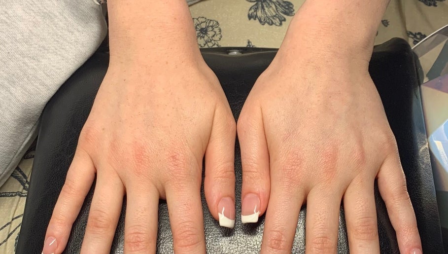 Freshly painted French manicure at Solé Beauty Studio, Kloof, Kwazulu-Natal, ZA. Perfect nails for a sophisticated look.