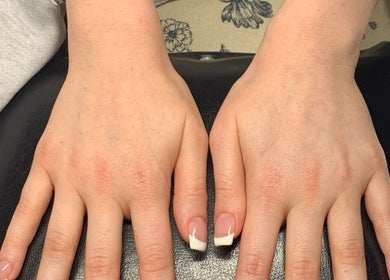Freshly painted French manicure at Solé Beauty Studio, Kloof, Kwazulu-Natal, ZA. Perfect nails for a sophisticated look.