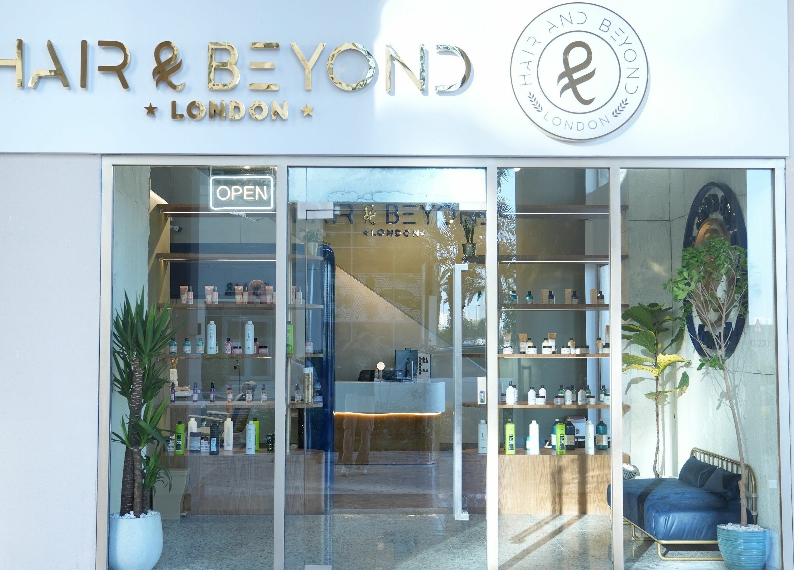 Exterior of The Hair and Beyond Salon, Jeddah, Makkah Province, SA featuring modern design and logo sign.