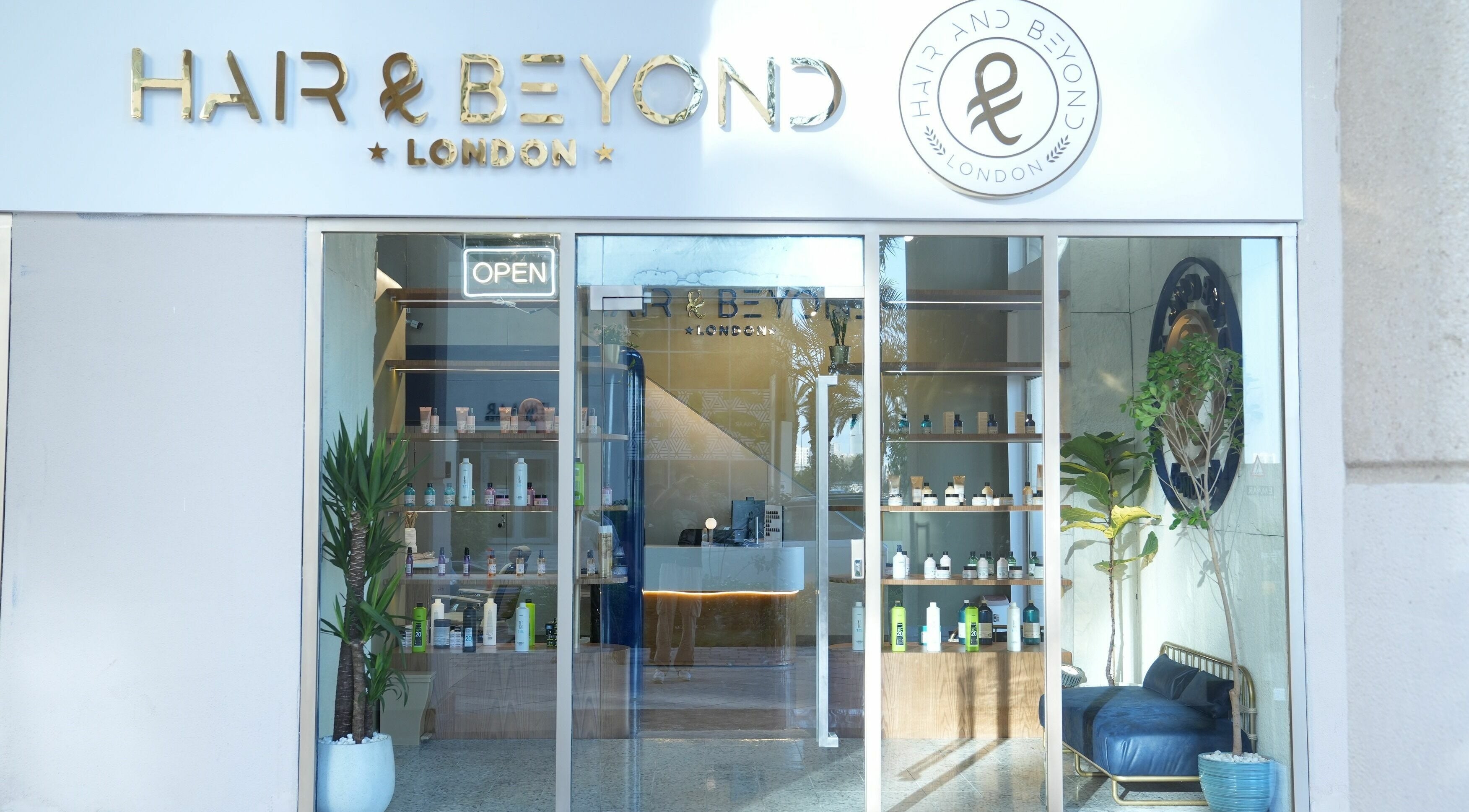 Exterior of The Hair and Beyond Salon, Jeddah, Makkah Province, SA featuring modern design and logo sign.
