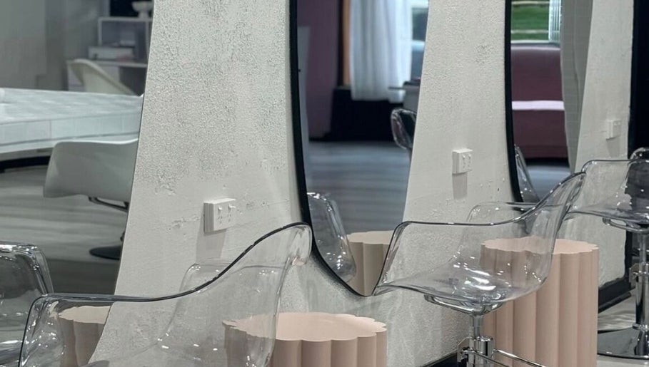 Modern salon interior with chic mirrors and chairs at Stranded by Anette, Islington, New South Wales, AU.