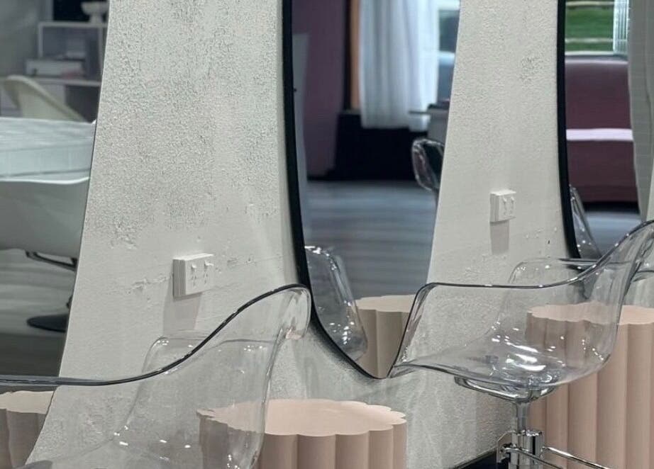 Modern salon interior with chic mirrors and chairs at Stranded by Anette, Islington, New South Wales, AU.