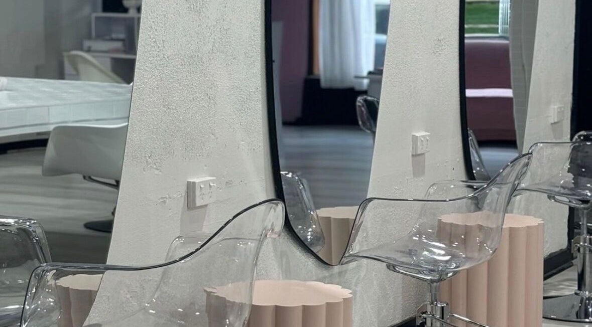 Modern salon interior with chic mirrors and chairs at Stranded by Anette, Islington, New South Wales, AU.