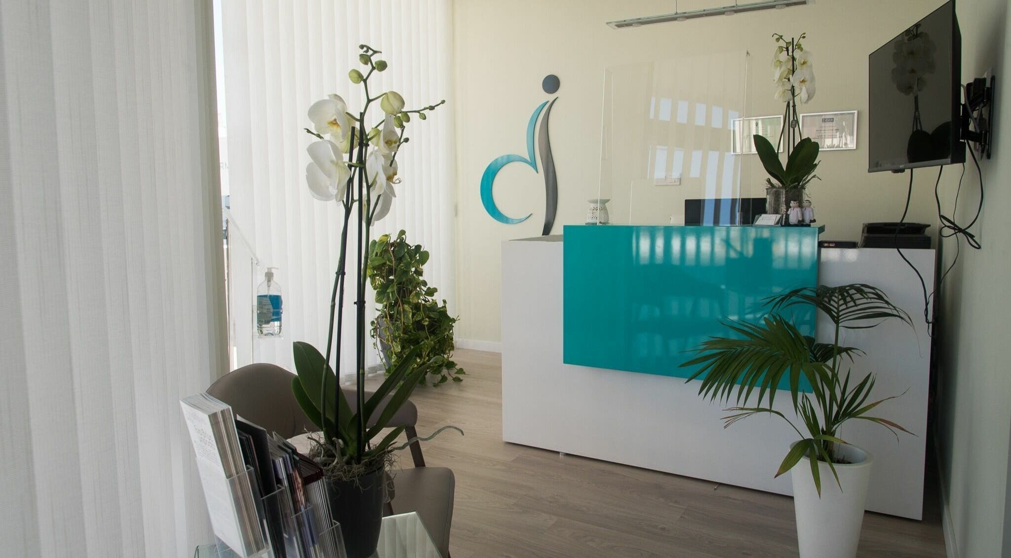 Elegant lobby of Derma Laser Beauty Lounge in Paralimni, Famagusta, CY with sleek decor and lush plants.