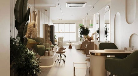 Elegant interior of BrowChuk by Vlada, London, England, GB, showcasing stylish chairs and modern decor.