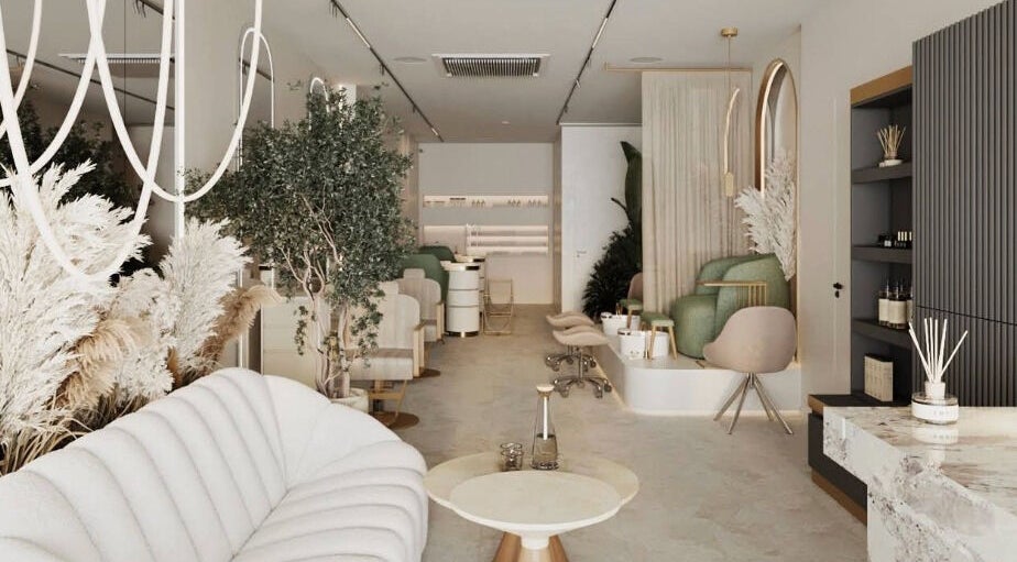 Luxurious interior of BrowChuk by Vlada, London, England, GB; elegant seating, greenery, and chic decor.