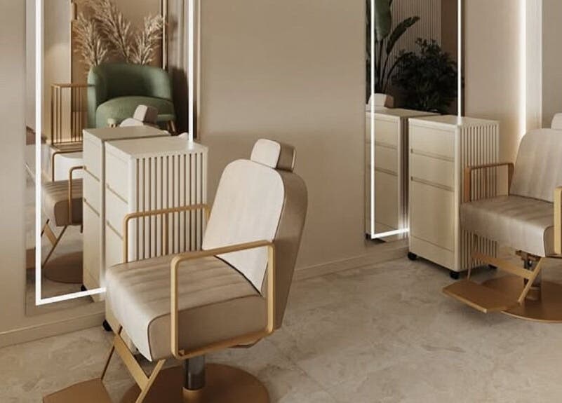 Luxurious salon chairs at BrowChuk by Vlada in London, England, GB, reflecting elegance and comfort.
