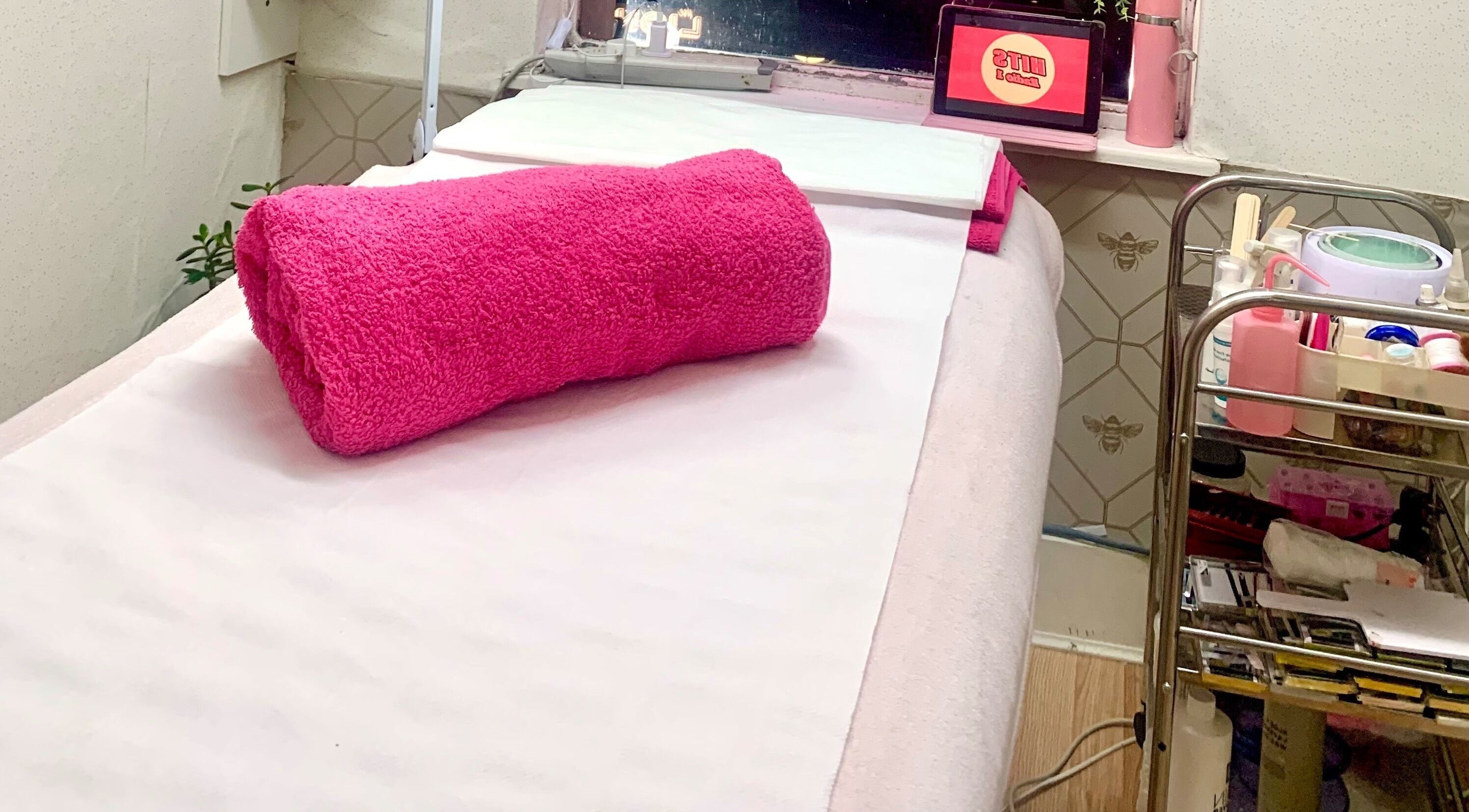 Relaxing treatment room at Belle Lash and Beauty in Birmingham, England, GB, featuring a cozy setup.