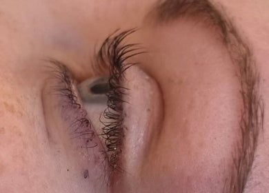 Close-up of expertly styled eyelashes at Eden Nails & Beauty, Glasgow, GB, showcasing precise beauty care.