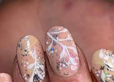 Artistic nail design with intricate patterns at Eden Nails & Beauty, Glasgow, GB.