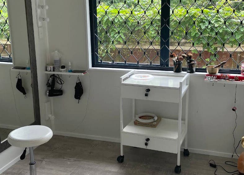 Cozy beauty room at Meena’s Beauty & Skincare in Auckland, NZ with natural light and elegant décor.