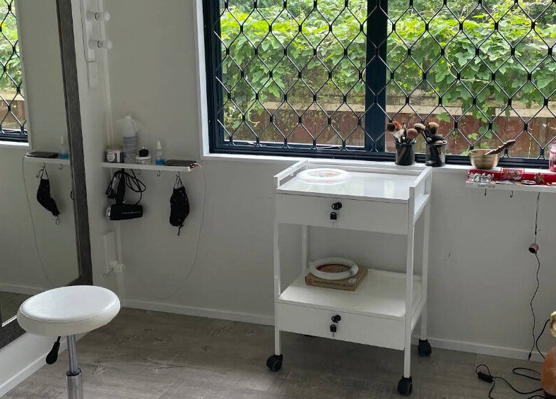 Cozy beauty room at Meena’s Beauty & Skincare in Auckland, NZ with natural light and elegant décor.