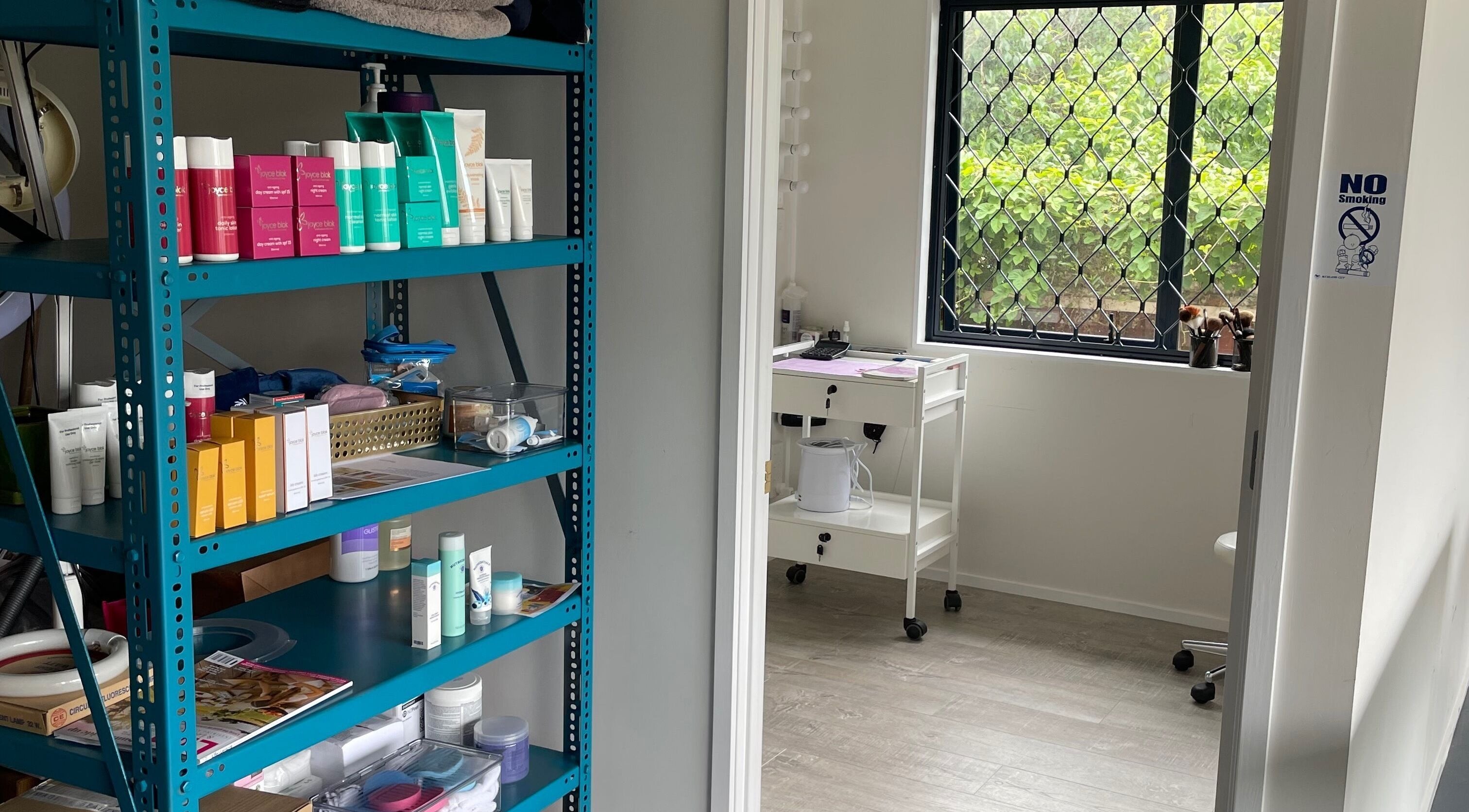Product shelves at Meena’s Beauty & Skincare, Auckland, NZ showcasing a bright and organized skincare space.