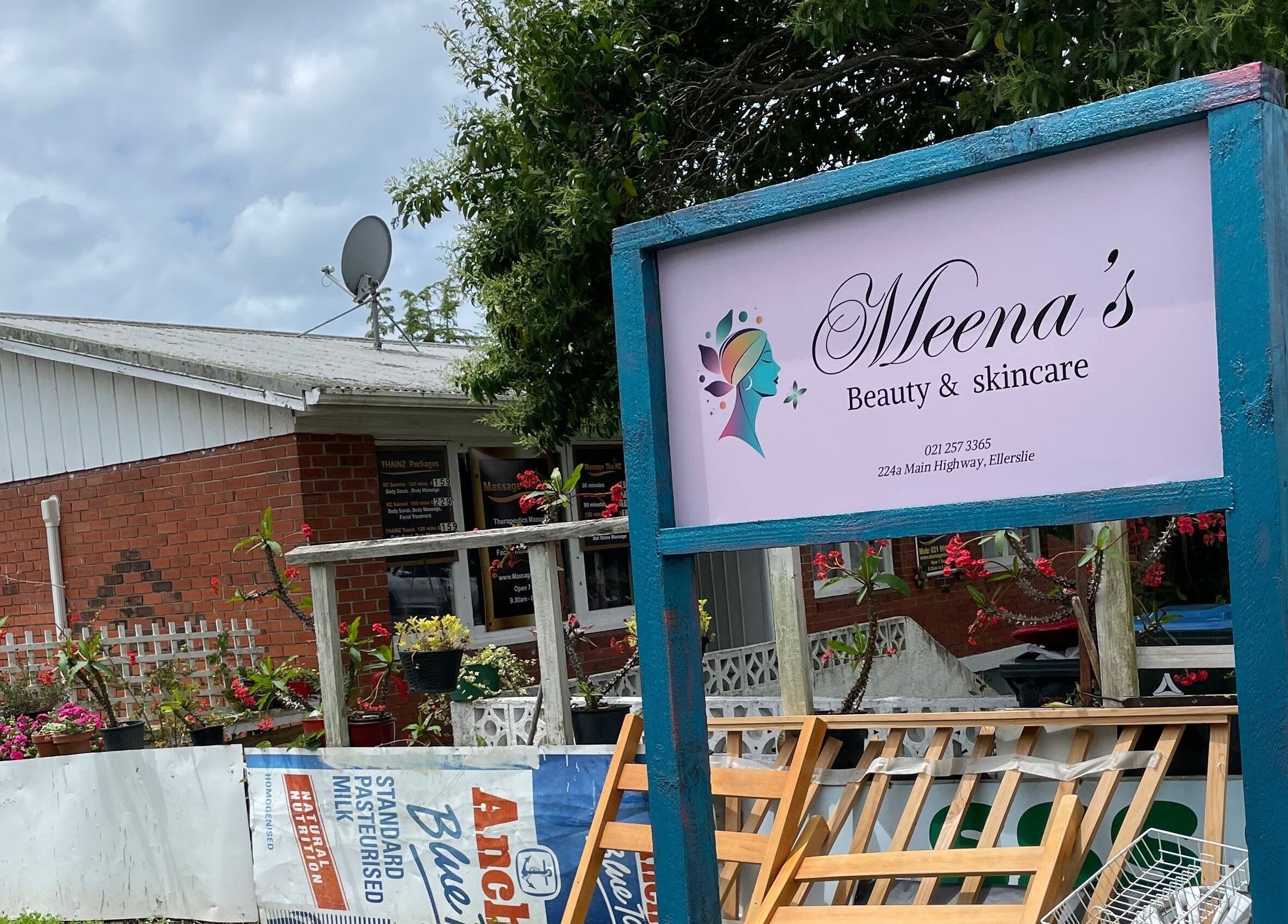 Welcoming entrance sign at Meena’s Beauty & Skincare in Auckland, Auckland, NZ with colorful flowers.