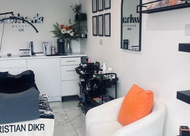Calming interior of Eyeluxe Bysarah in Aldridge, England, GB showcasing a modern, well-equipped beauty room.