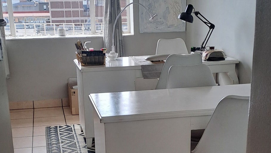 Modern workspace at Miss P. Beauty Box, Alberton, Gauteng, ZA with stylish white furniture and natural lighting.