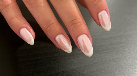 Elegant nail design at Nails by Layla, Sherford, England, GB. Soft pink gradient on manicured nails.