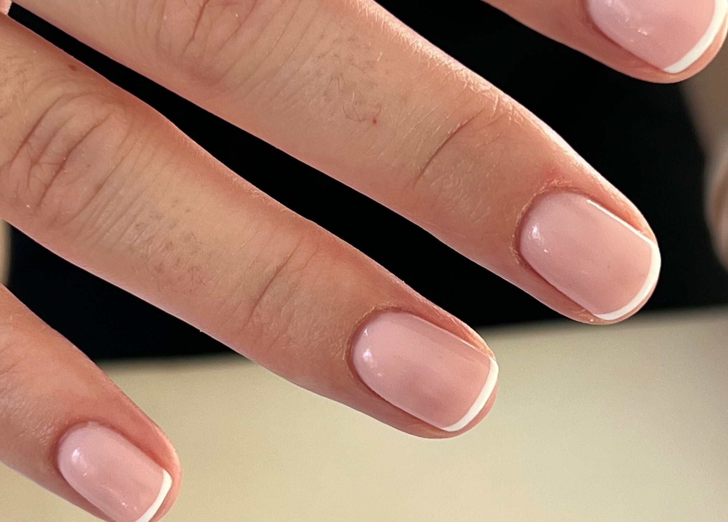 French manicure with pastel pink at Nails by Layla, Sherford, England, GB. Perfectly painted nails.