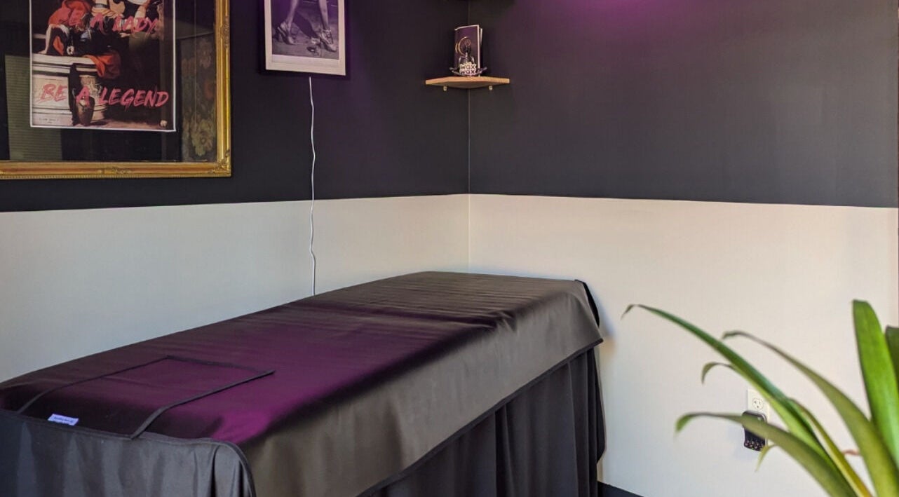 Calming treatment room at Prohibited Face and Body Bar in Quakertown, Pennsylvania, US, with cozy decor.