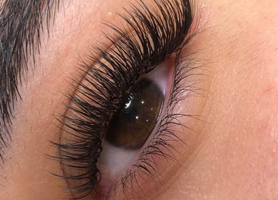 Close-up of expertly done eyelash extensions at JL Lash Brow Room, Johns Creek, Georgia, US.