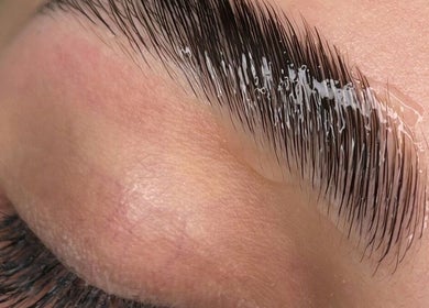 Close-up of expertly groomed eyebrow at JL Lash Brow Room, Johns Creek, Georgia, US.