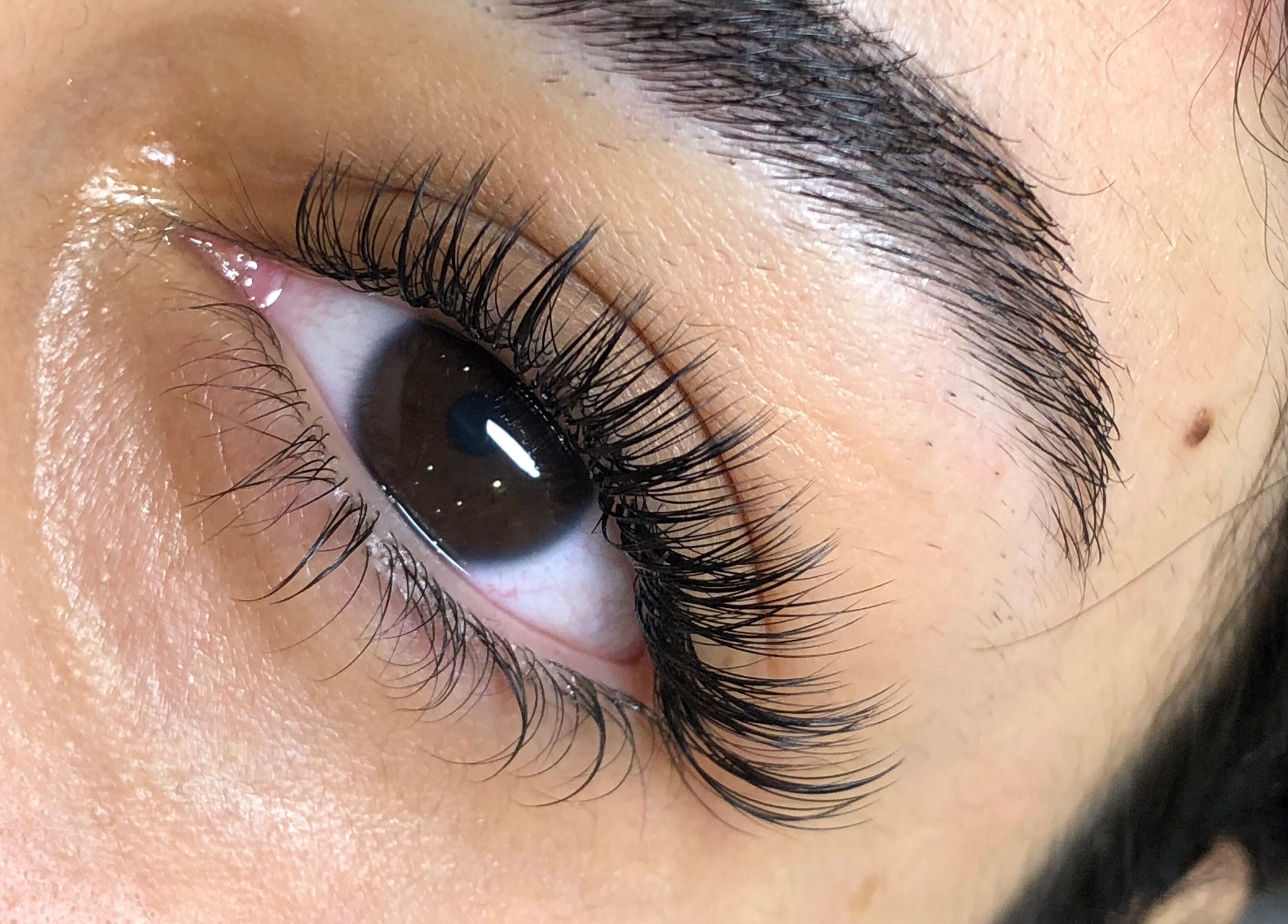 Close-up of exquisite eyelash extension at Lash Brow Room, Johns Creek, Georgia, US.