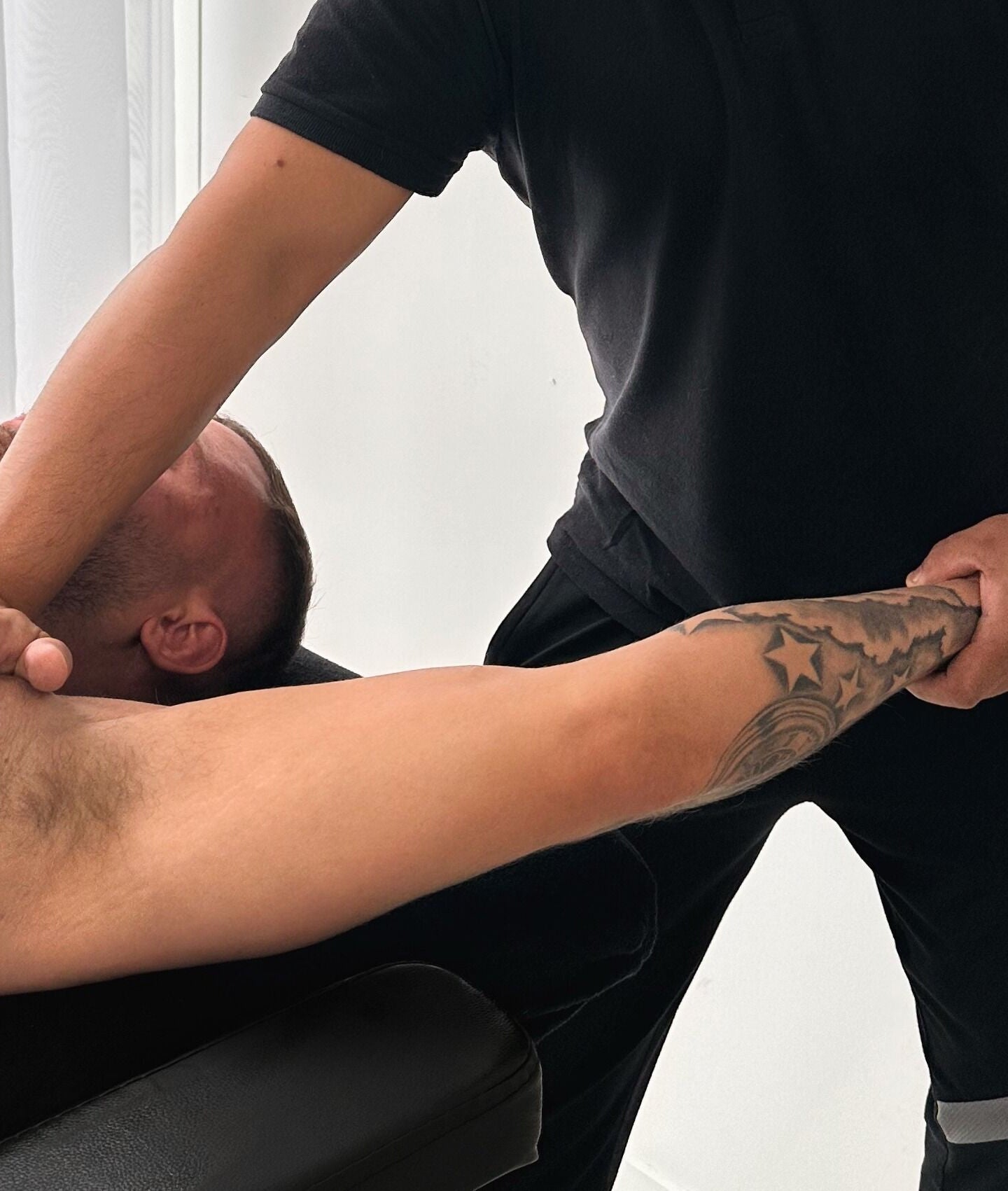 Therapist performing massage at TheMassageWorks (Finsbury Park) in London, England, GB.